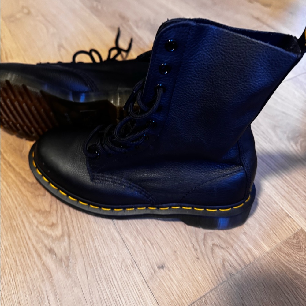 Doc Martens black leather mid calf boots.